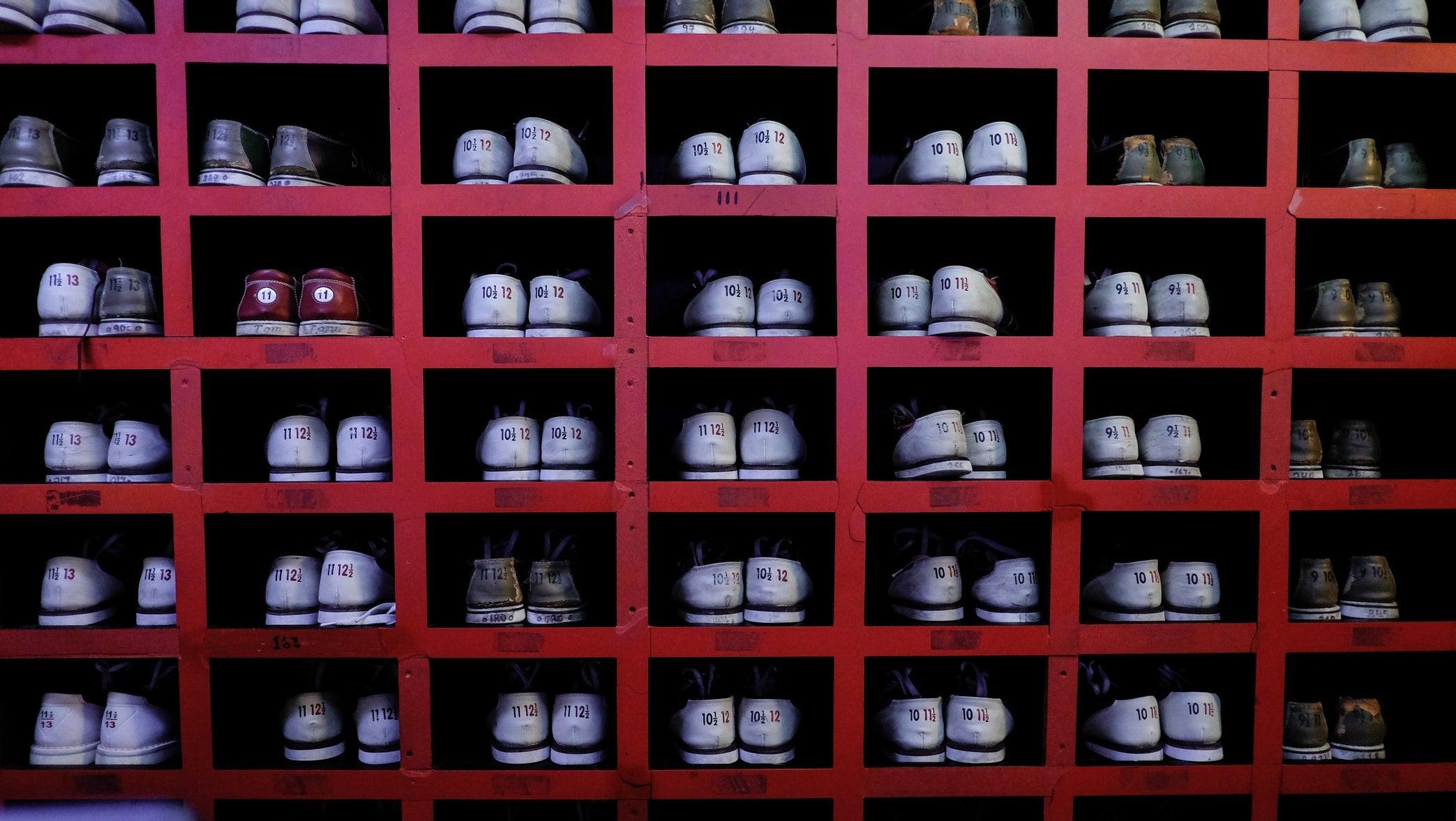 Different styles of sneakers at a store 