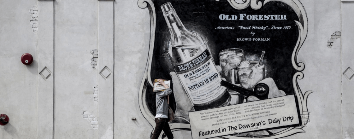 Black and white print advertisement for Old Forester whiskey